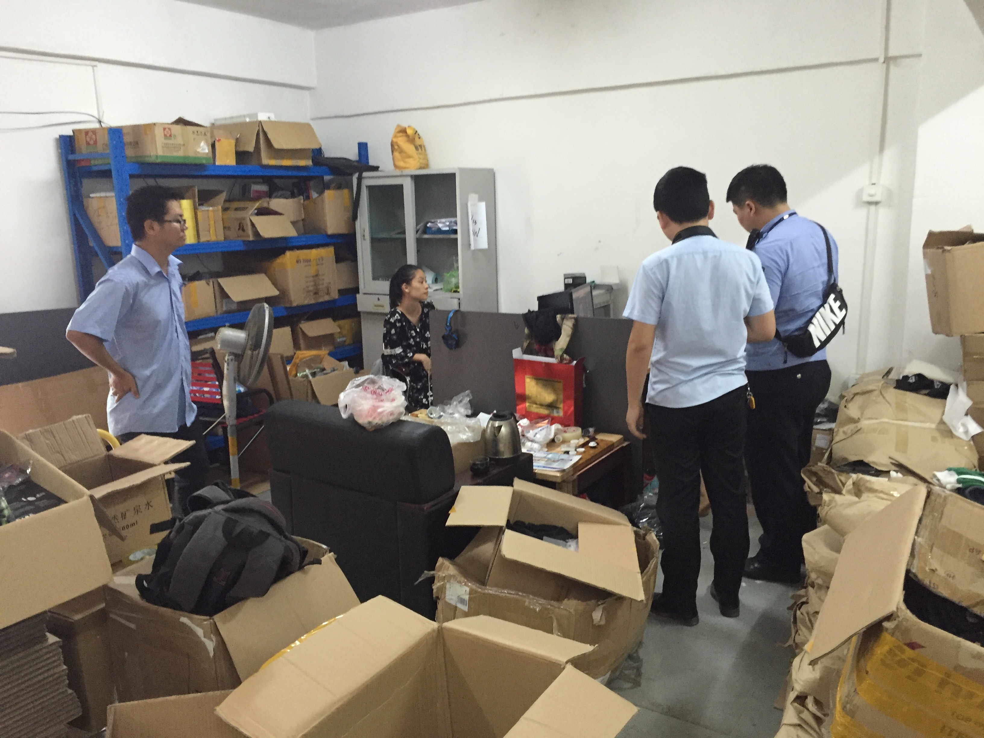 Administration for Industry and Commerce officials review the seized stock