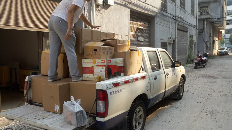 Seized inventory loaded for removal from the facility